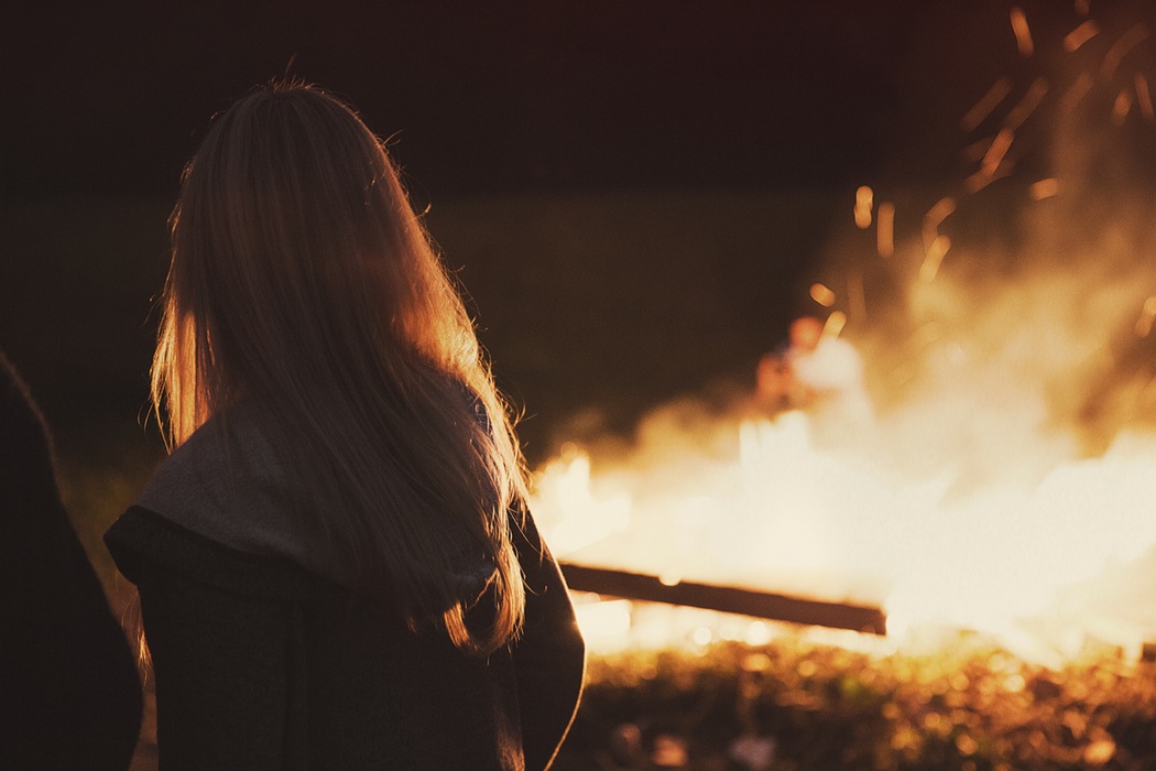 Girl in front of bon fire